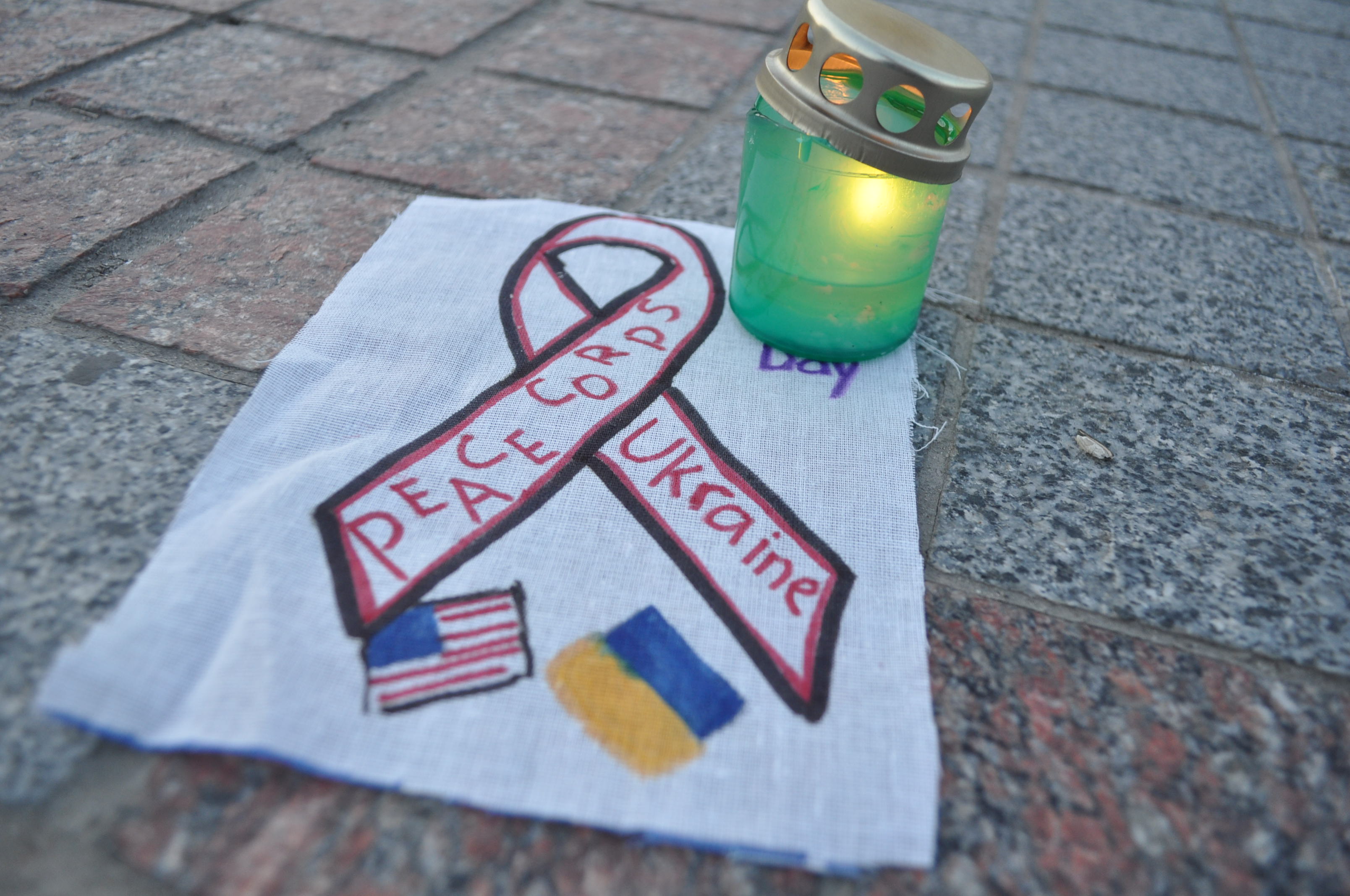 Candle lighting a small HIV/AIDS banner, Rivne, Ukraine, 2012, PC Digital Library